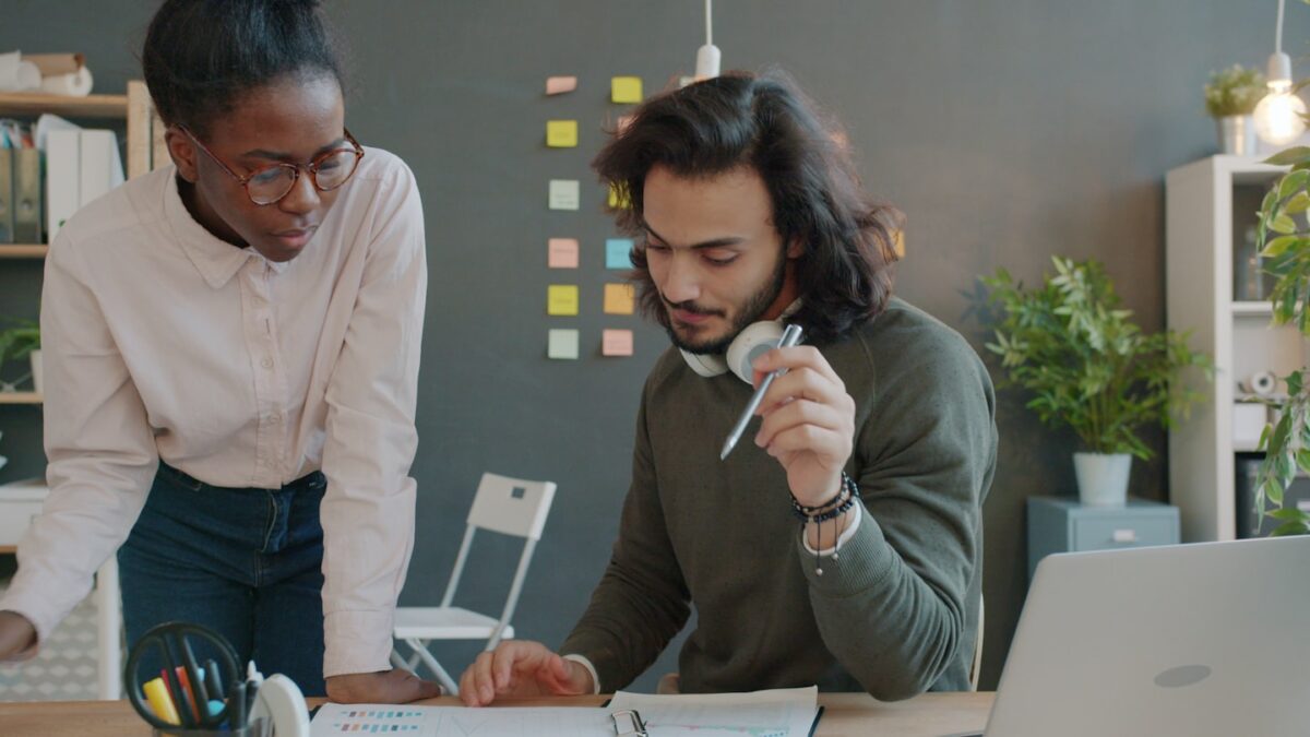 team discussing ai ad generator